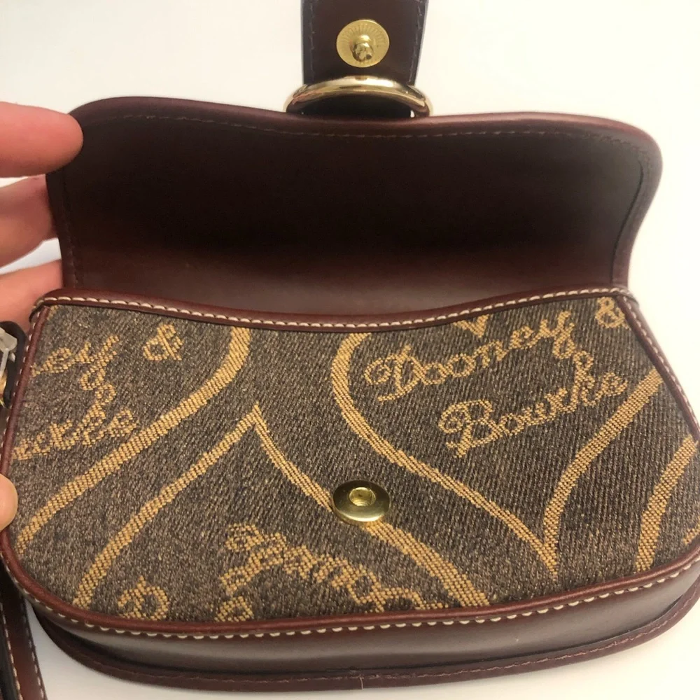 Dooney & Bourke vintage flap wristlet